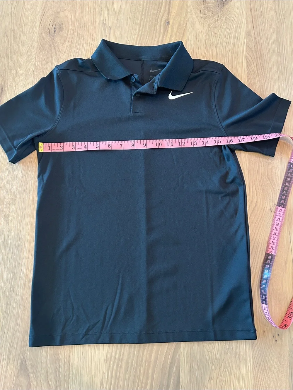 Nike Black Kids Polo with White Swoosh